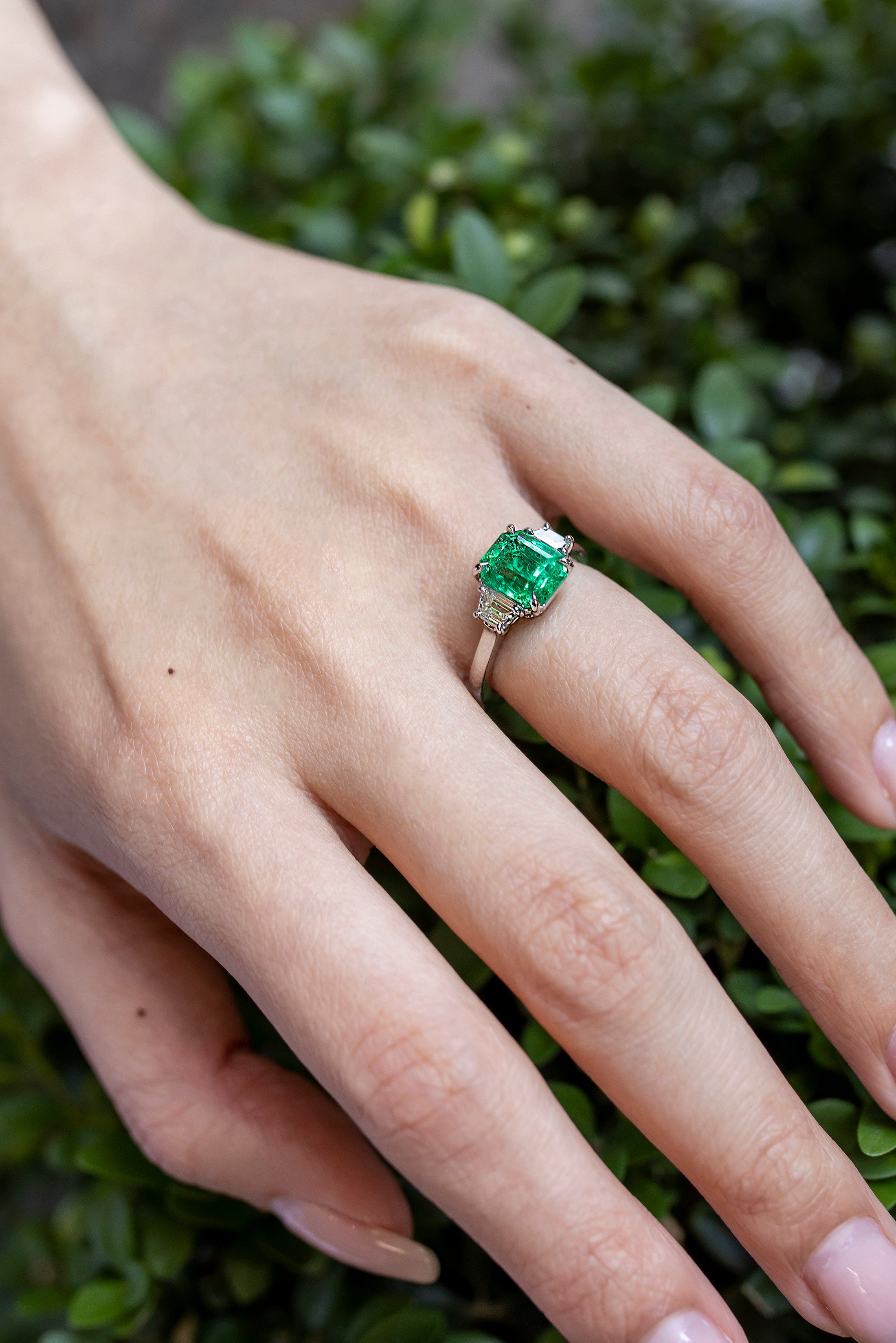 2.49 Carats Radiant Cut Colombian Emerald & Diamond Three-Stone Engagement Ring in Platinum