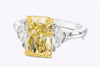 GIA Certified 4.02 Carats Radiant Cut Fancy Yellow Diamond Three Stone Engagement Ring in Yellow Gold and Platinum