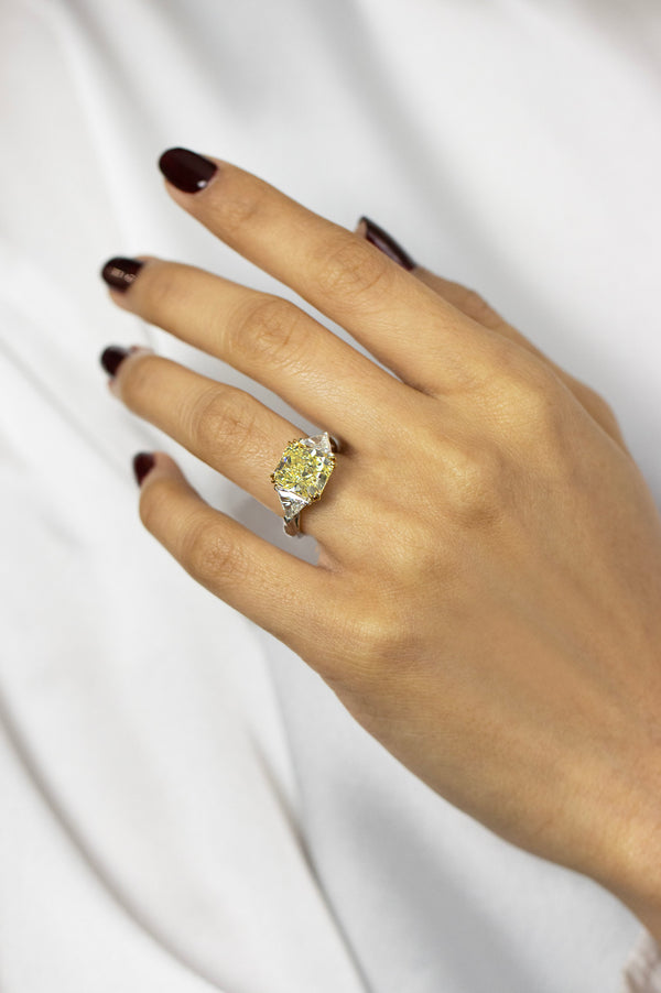 GIA Certified 4.50 Carats Radiant Cut Yellow Diamond Three-Stone Engagement Ring in Platinum