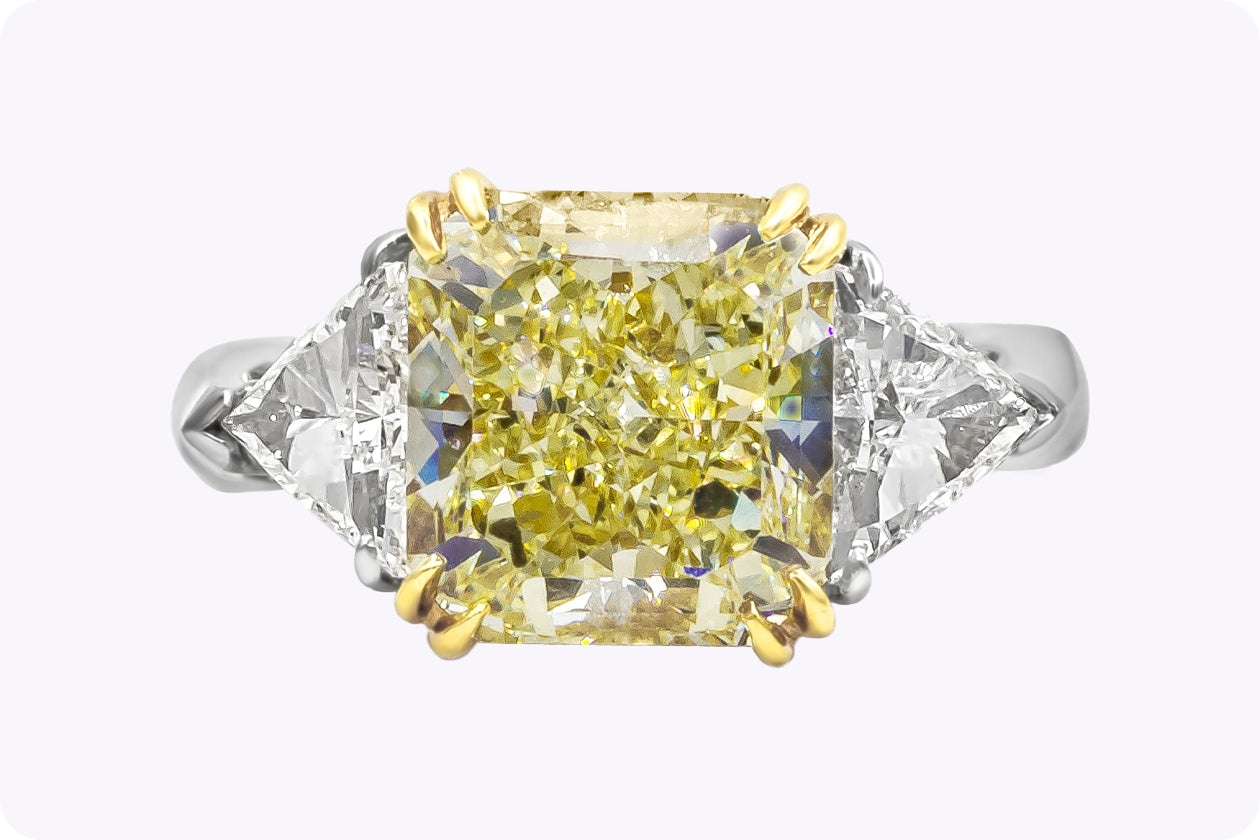 GIA Certified 4.50 Carats Radiant Cut Yellow Diamond Three-Stone Engagement Ring in Platinum