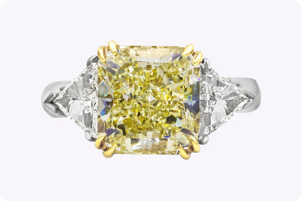 GIA Certified 4.50 Carats Radiant Cut Yellow Diamond Three-Stone Engagement Ring in Platinum