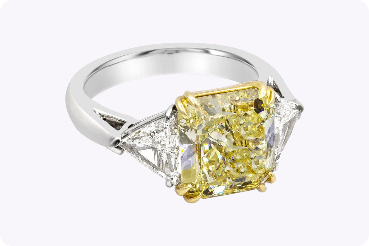 GIA Certified 4.50 Carats Radiant Cut Yellow Diamond Three-Stone Engagement Ring in Platinum