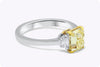 GIA Certified 2.02 Carats Radiant Cut Fancy Yellow Diamond Three-Stone Engagement Ring in Yellow Gold and Platinum
