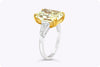 7.02 Carats Radiant Cut Yellow Diamond Three-Stone Engagement Ring in Yellow Gold & Platinum