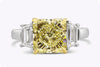 3.39 Carat Radiant Cut Yellow Diamond Three-Stone Engagement Ring in Platinum