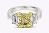 GIA Certified 3.39 Carats Radiant Cut Yellow Diamond Three-Stone Engagement Ring in Yellow Gold & Platinum