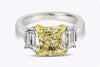 3.39 Carat Radiant Cut Yellow Diamond Three-Stone Engagement Ring in Platinum