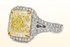 GIA Certified 4.51 Carats Radiant Cut Fancy Yellow Diamond Halo Engagement Ring in Yellow Gold and Platinum