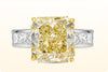 GIA Certified 9.36 Carats Radiant Cut Fancy Yellow Diamond Engagement Ring in Yellow Gold and Platinum