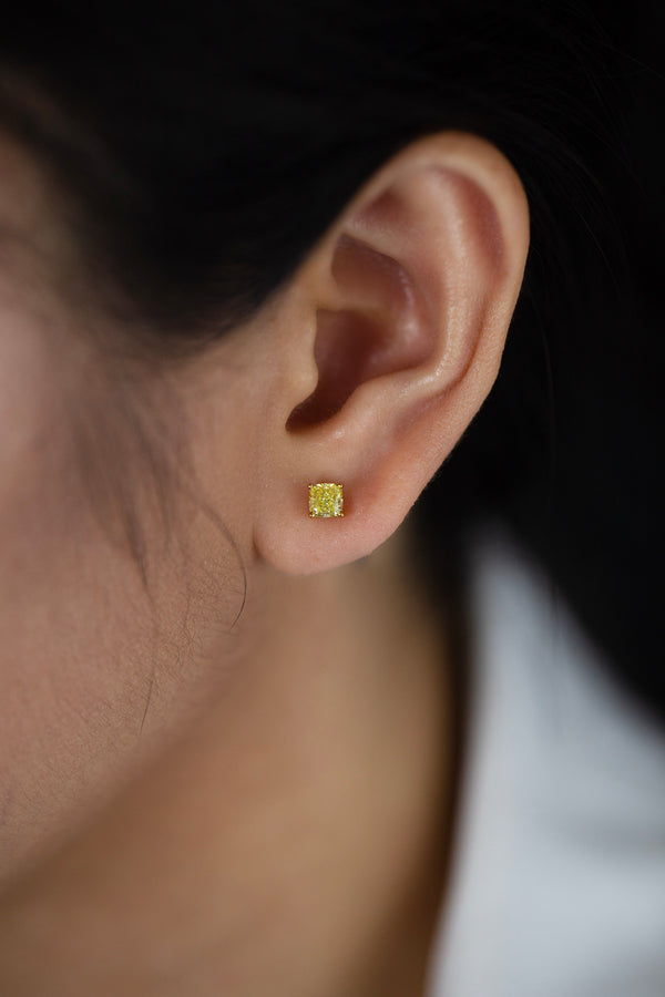 0.85 Carats Total Cushion Cut Fancy Intense Yellow Diamond Stud Earrings in Yellow Gold