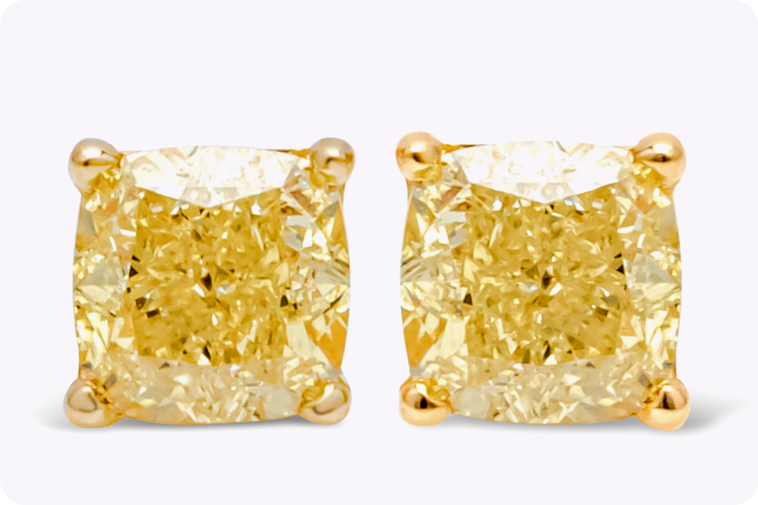 0.85 Carats Total Cushion Cut Fancy Intense Yellow Diamond Stud Earrings in Yellow Gold