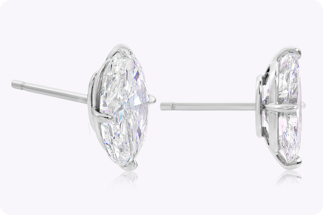 GIA Certified 4.01 Carats Total Elongated Oval Brilliant Cut Diamond Stud Earrings in Platinum