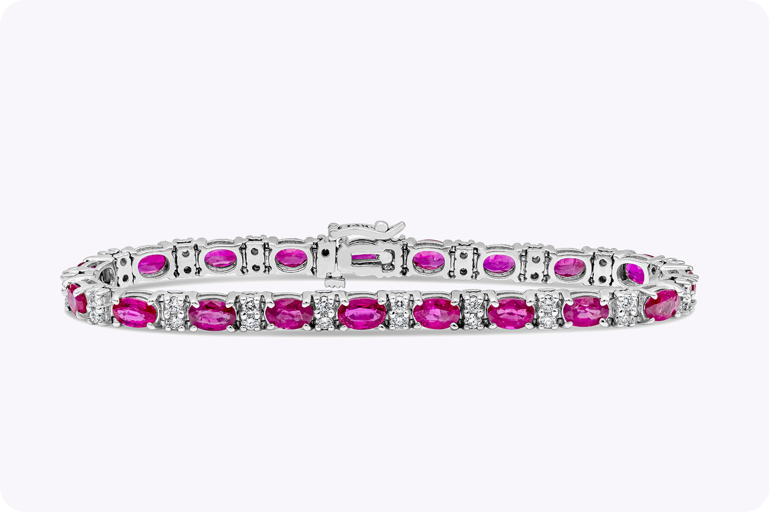 11.11 Carats Total Oval Cut Pinkish Ruby & Diamond Tennis Bracelet in White Gold