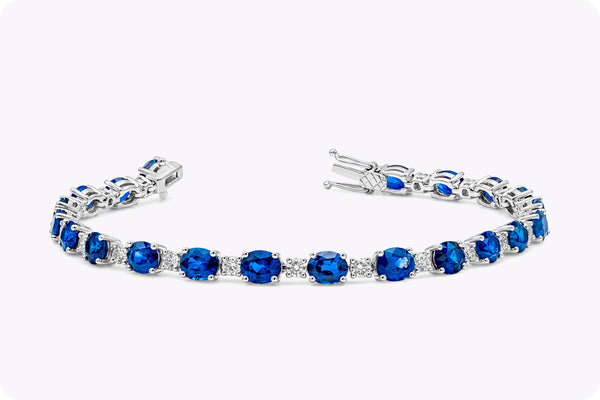 12.56 Carats Oval Cut Sapphire & Diamond Tennis Bracelet in White Gold