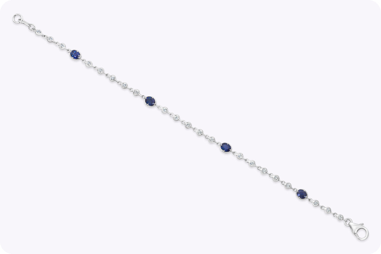 1.65 Carats Total Oval Cut Sapphires By the Yard & Diamond Bracelet in White Gold