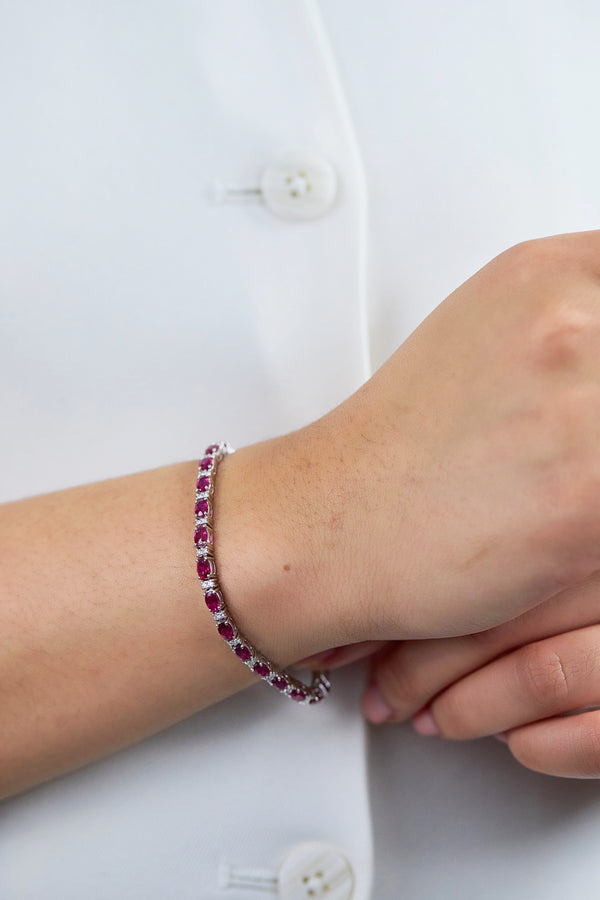 6.49 Carats Oval Cut Ruby & Diamond Tennis Bracelet in White Gold