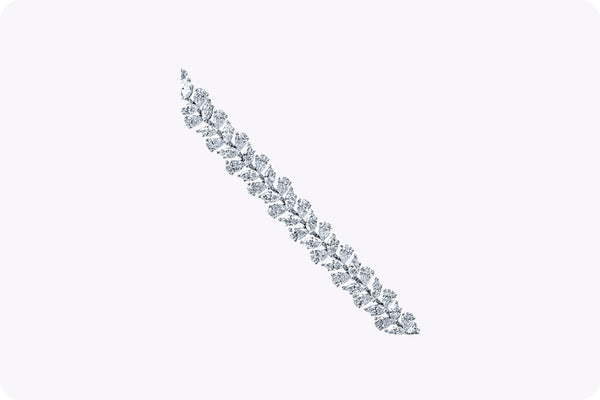 Elegant 11.25-carat marquise and pear shape diamond bracelet in white gold