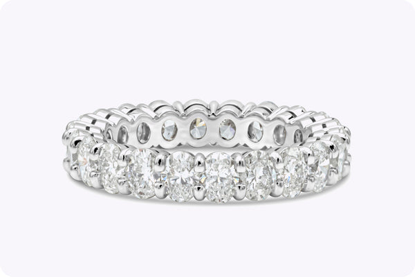 3.18 Carats Total Oval Cut Diamonds Eternity Wedding Band in Platinum