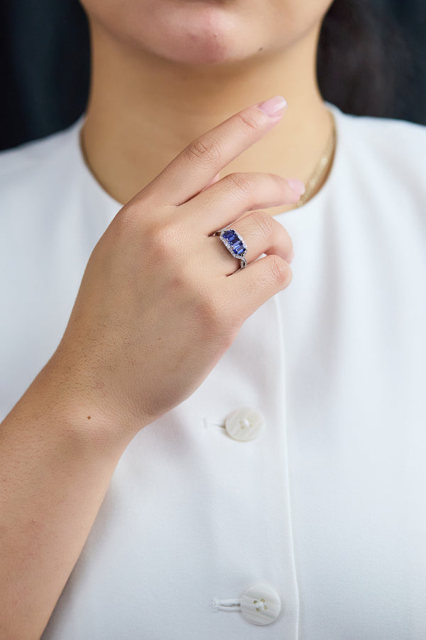 1.81-carat emerald cut sapphire and diamond fashion ring.