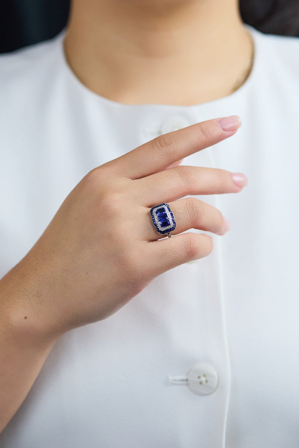 2.01 carat emerald-cut sapphire and diamond double halo ring