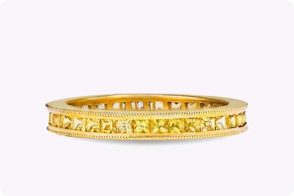 Channel set yellow sapphite eternity band ring