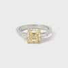 GIA Certified 2.13 Carats Asscher Cut Yellow Diamond Three-Stone Engagement Ring in Yellow Gold & Platinum