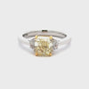 GIA Certified 2.02 Carats Radiant Cut Yellow Diamond Three-Stone Engagement Ring in Yellow Gold & Platinum