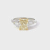 GIA Certified 2.05 Carats Radiant Cut Yellow Diamond Three-Stone Engagement Ring in Platinum