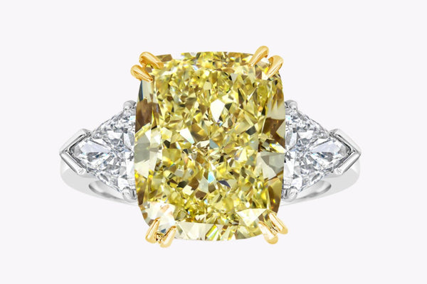 GIA Certified 10.11 Carats Cushion Cut Yellow Diamond Three-Stone Engagement Ring in Platinum