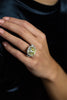 GIA Certified 15.52 Carat Cushion Cut Fancy Yellow Diamond Three-Stone Halo Engagement Ring in Platinum