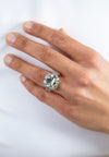 Cushion cut diamond engagement ring in platinum worn