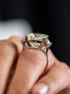 Cushion cut diamond engagement ring in platinum worn