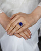 15.68 Carat Cushion Cut Ceylon Intense Blue Sapphire Three-Stone Engagement Ring in Platinum