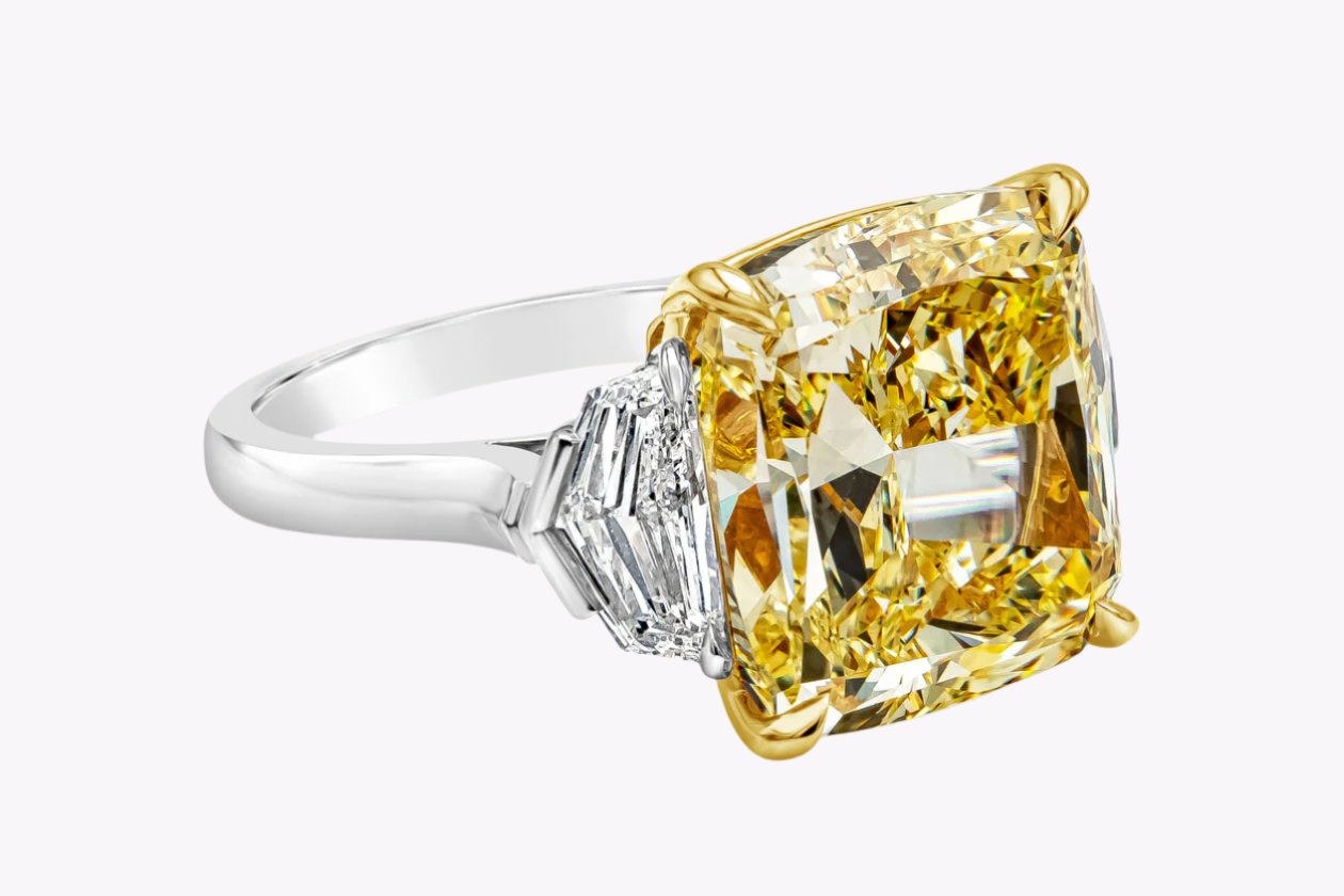 GIA Certified 10.02 Carats Cushion Cut Yellow Diamond Three-Stone Engagement Ring in Yellow Gold & Platinum