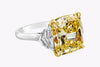 GIA Certified 10.02 Carats Cushion Cut Yellow Diamond Three-Stone Engagement Ring in Yellow Gold & Platinum