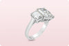GIA Certified 8.47 Carats Total Cushion Cut Diamond Three Stone Engagement Ring in Platinum