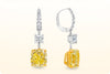 GIA Certified 8.48 Carat Total Radiant Cut Fancy Intense Yellow Diamond Dangle Earrings in Platinum