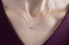 0.74 Carat Round Diamond Bezel Solitaire Pendant Necklace in White Gold