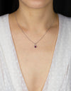 0.38 Carat Total Oval Cut Ruby and Diamond Halo Pendant Necklace in White Gold