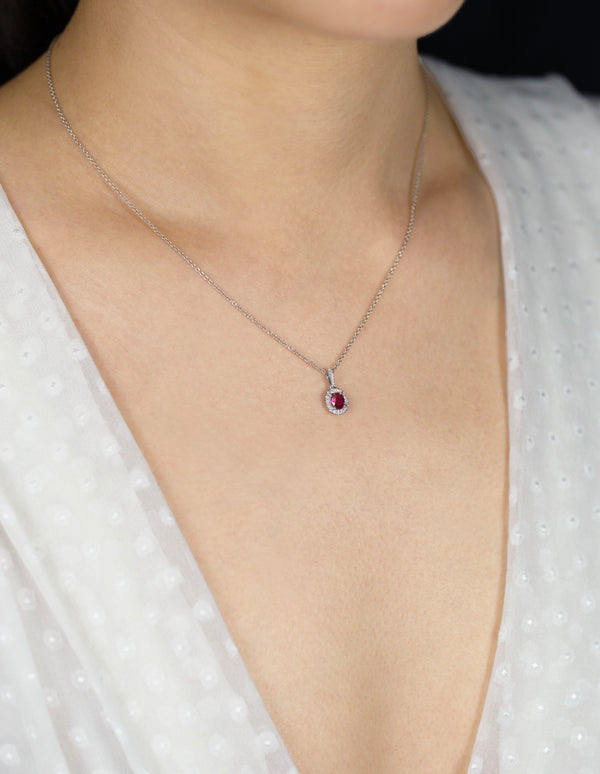 0.38 Carat Total Oval Cut Ruby and Diamond Halo Pendant Necklace in White Gold