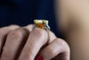 GIA Certified 14.54 Carat Emerald Cut Fancy Yellow Diamond Three-Stone Engagement Ring in Platinum