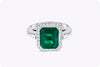 4.58 Carat Emerald Cut Green Emerald and Diamond Halo Engagement Ring in White Gold