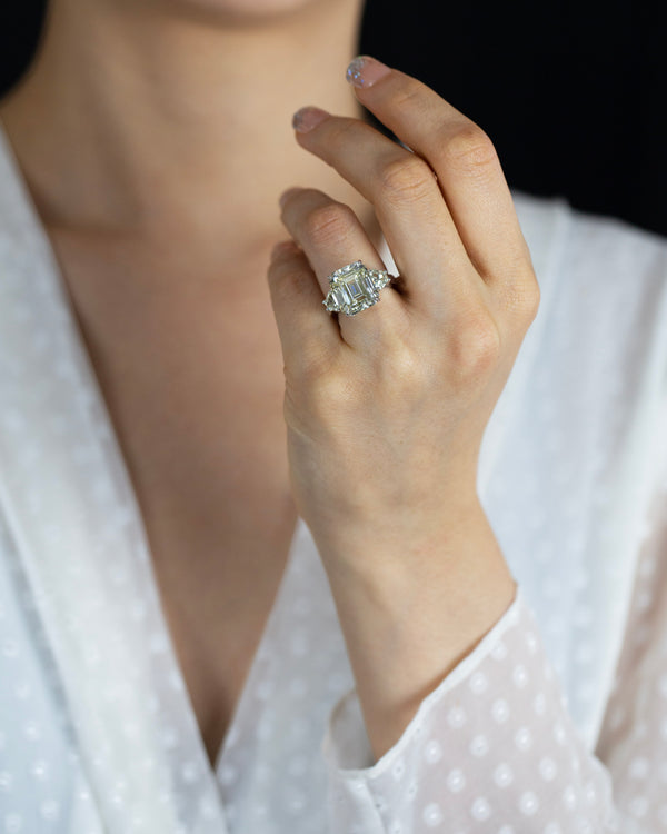 11.11 Carats Emerald Cut Diamond Three-Stone Engagement Ring in Platinum