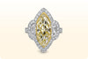 GIA Certified 5.43 Carat Marquise Cut Fancy Yellow Diamond Halo Engagement Ring with Mixed Cut White Diamonds