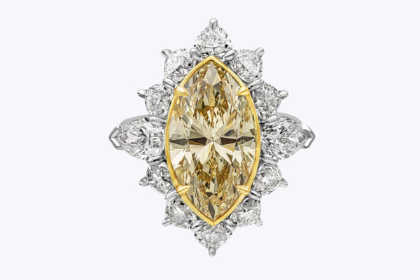 GIA Certified 5.58 Carats Marquise Cut Yellow Diamond Halo Ring in Platinum