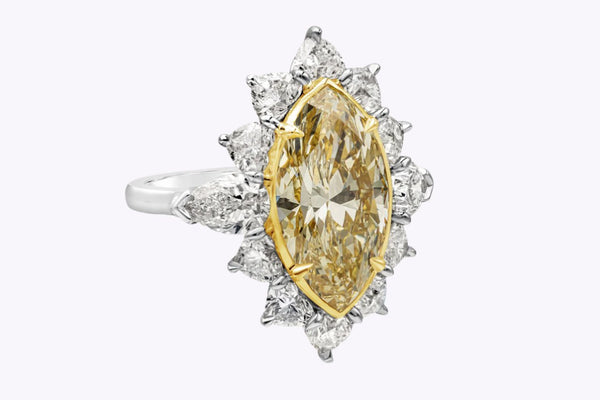 GIA Certified 5.58 Carats Marquise Cut Yellow Diamond Halo Ring in Platinum