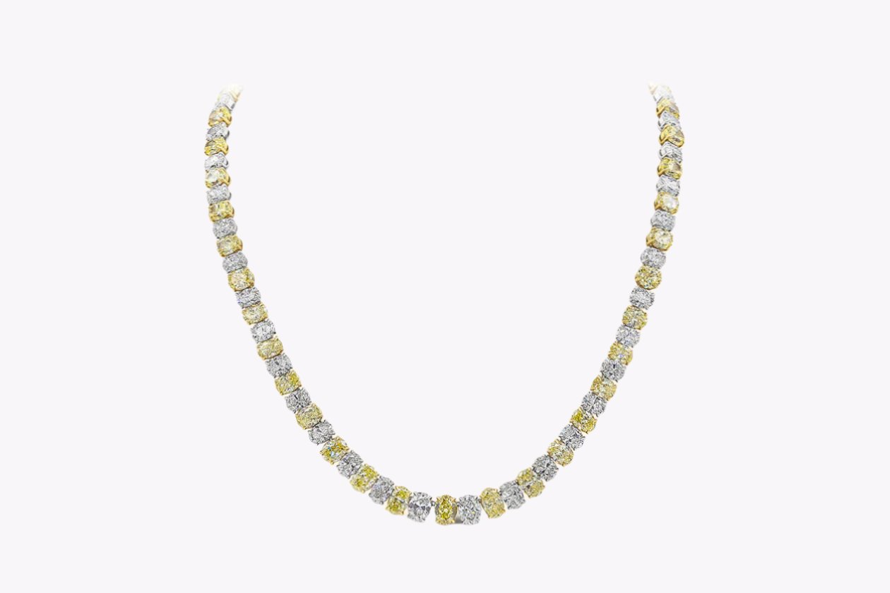 54.75 Carats Total Alternating Oval Cut Yellow & White Diamond Tennis Necklace in Platinum