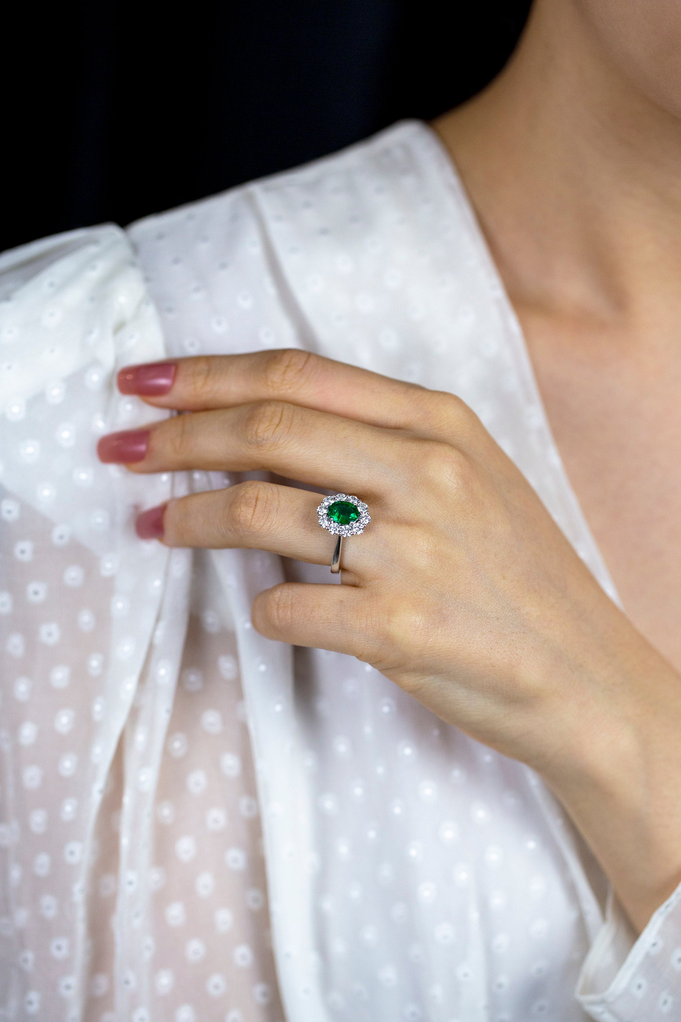 1.12 Carats Oval Cut Emerald & Diamond Halo Floral Engagement Ring in White Gold