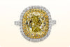 GIA Certified 7.06 Carat Oval Cut Fancy Yellow Diamond Double Halo Engagement Ring in Two Tone