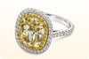 GIA Certified 7.06 Carat Oval Cut Fancy Yellow Diamond Double Halo Engagement Ring in Two Tone